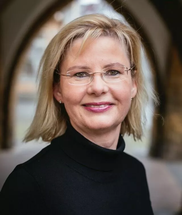 Dr.