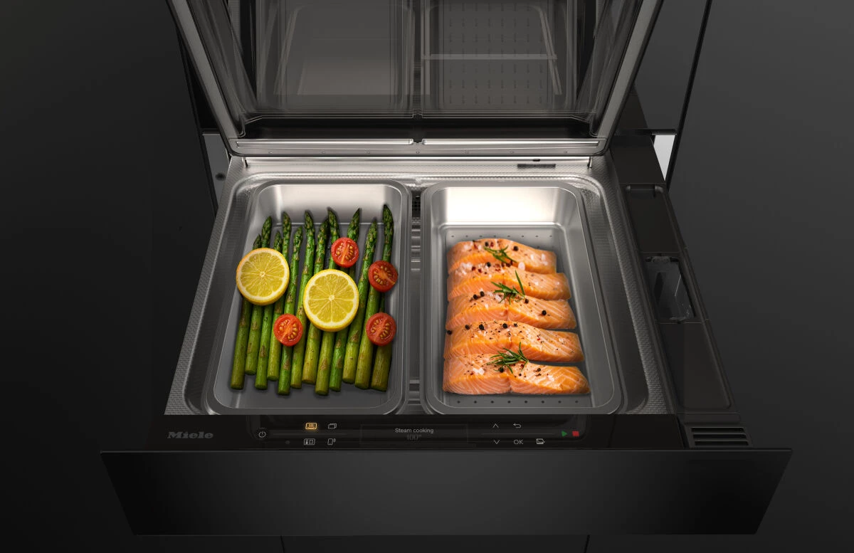 The new steam drawer from Miele – a space-saving 3-in-1 solution for baking, reheating and steam cooking. With two separate steam cooking containers for preparing different food at the same time.